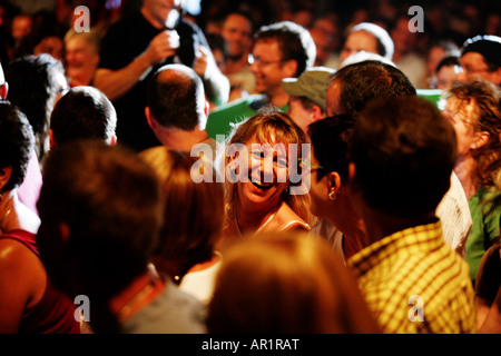 Audience watching a show in a small theatre Stock Photo