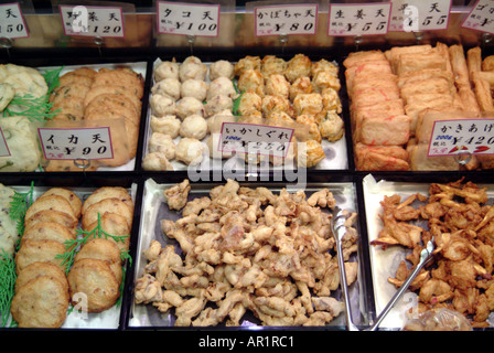 Fried fish on a Nishiki street market stall Kyoto Japan Stock Photo