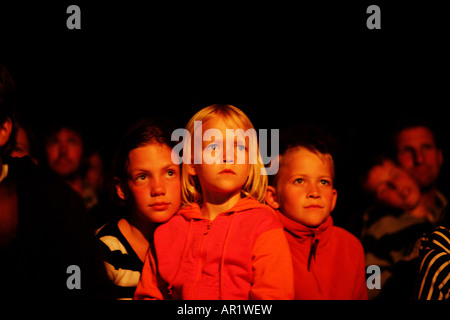 Audience watching a show in a small theatre Stock Photo