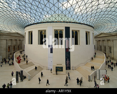 Horizontal elevated wide angle (2 picture stitch panoramic) of the Great Court and Reading room at the British Museum in the sun Stock Photo