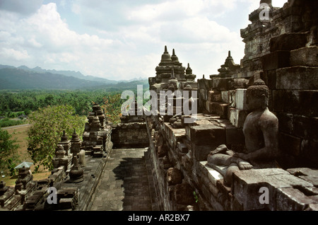 Indonesia Java Borobudur largest Buddhist temple in Indonesia upper tiers and surrounding landscape Stock Photo