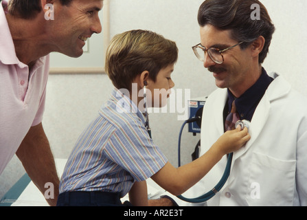 Doctor and young playful patient, physical exam, Miami Stock Photo