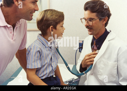 Doctor and young playful patient, physical exam, Miami Stock Photo