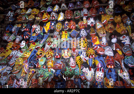 Painted masks stall, Chichicastenango market, highlands of Guatemala,  Central America. Stock Photo