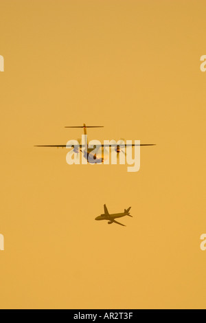 Two Aeroplanes flying close Stock Photo