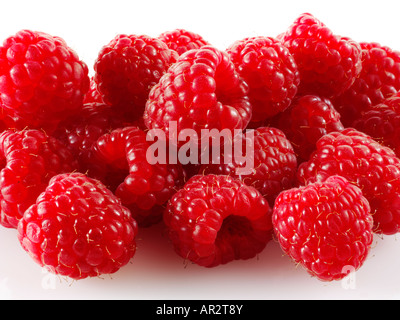 pile of Raspberries on a white background Stock Photo