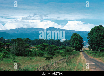 Mount Elgon 14 178 ft and the tarmac road with potholes towards the mountain from Kitale in Western Kenya East Africa Stock Photo