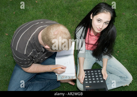 Two students studying outdoors Stock Photo