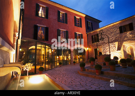 Inner courtyard of the Gran Hotel Son Net in the evening, Puigpunyent, Mallorca, Spain, Europe Stock Photo