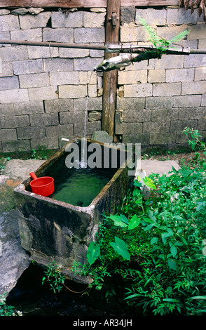 Aug 24, 2006 - Makeshift water basin in the Yao minority village of Long Ji in China's Guangxi province Stock Photo