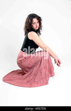 Portrait of young woman with long skirt Stock Photo