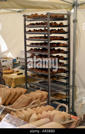Baskets of French bread at market Different varieties in wicker baskets Stock Photo