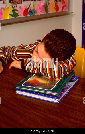 Boy age 12 sleeping in class. St Paul Minnesota USA Stock Photo
