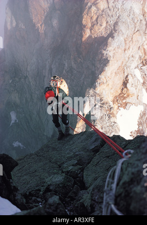 Climber abseiling down into Shipton s Notch on the West Ridge of Batian Mount Kenya Kenya East Africa Stock Photo