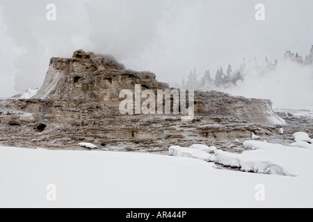 Yellowstone National Park in winter snow Castle Geyser Stock Photo