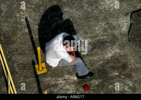 A lonely man. Votorantim, São Paulo, Brazil. 7 Sep 2005. Stock Photo