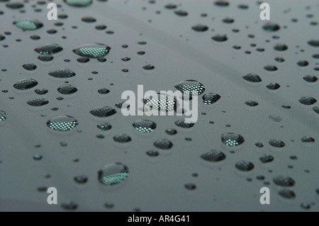 Drops of water over bonnet of a car London Oct 2004 Stock Photo