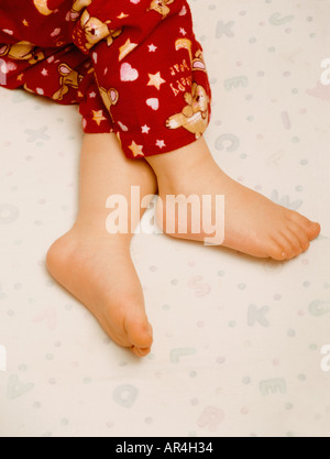 Close up of sleeping child's feet and toes Stock Photo