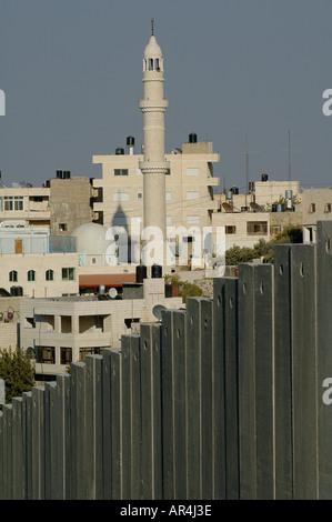 View of the Israeli West Bank separation barrier cutting through Abu Dis or Abu Deis a Palestinian community at the suburbs of East Jerusalem Israel Stock Photo