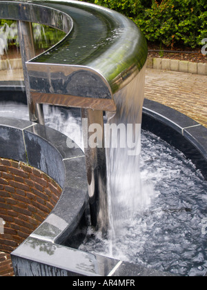 Detail of a Water feature creating a semi-circular curtain of water, Serpent Garden Alnwick Gardens Northumberland UK Stock Photo