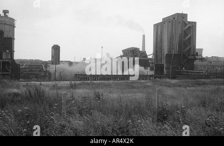 Demolition of redundant coke oven coal storage bunker by explosion on derilict works. Stock Photo