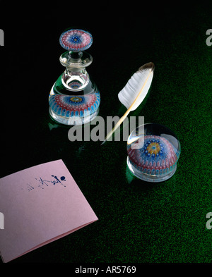 quill feather pen and blotting paper and ink well Stock Photo