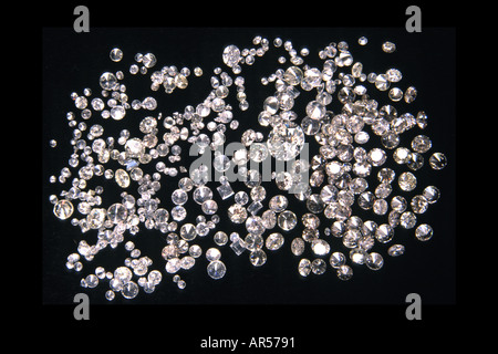 Assorted cut and polished diamonds on black velvet. This image was previously available as image A9D399. Stock Photo