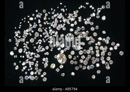 Assorted cut and polished diamonds on black velvet. This image was previously available as image A9D399. Stock Photo