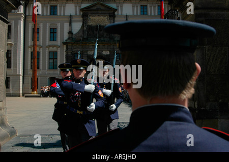 Castle guards marching during changing of guards process at the main entrance to Prague Castle in Czech republic