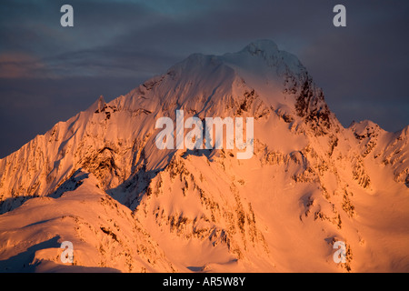 Alpenglow on Mt Alice Chugach National Forest from Seward Alaska Stock Photo