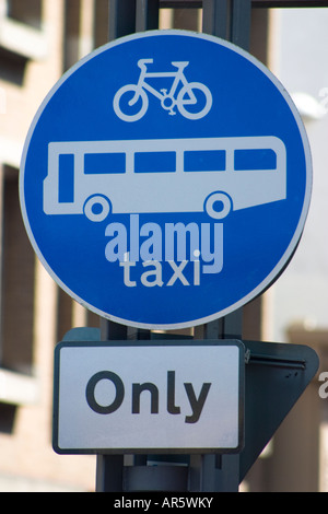 Restricted access bicycles buses and taxis only road sign Stock Photo