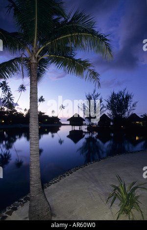 Overwater Bungalows at Dusk, InterContinental Beachcomber Resort, Moorea, French Polynesia Stock Photo