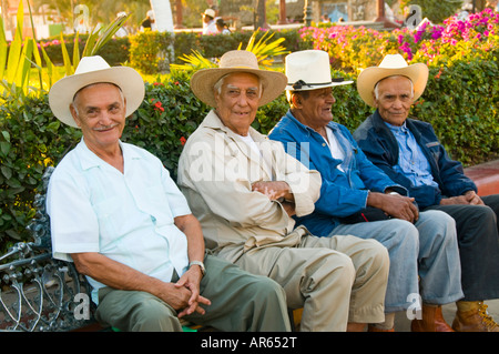 Mexico Bucerias near Nuevo Vallarta Riviera Nayarit Puerto Vallarta Pacific Coast seniors sitting on bench enjoying the day Stock Photo