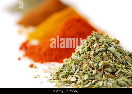 Heaps of various ground spices on white background Stock Photo