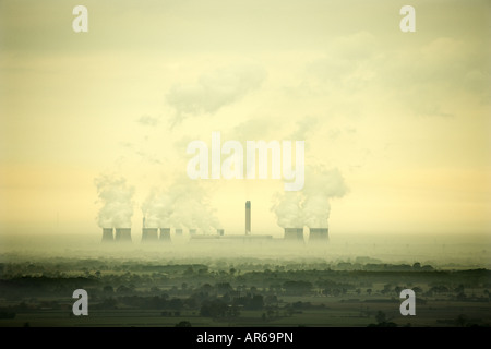 Steam rising from the giant cooling towers of Drax coal power station at sunrise Yorkshire England UK Stock Photo