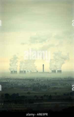 Steam rising from the giant cooling towers of Drax coal power station at sunrise Yorkshire England UK Stock Photo