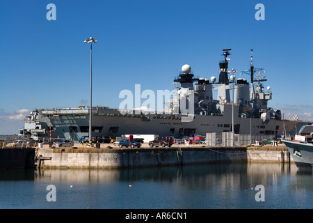The Invincible class CVS aircraft carrier HMS Illustrious at her moorings at Portsmouth Stock Photo