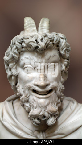 Pan Greek god goat horn head shoulder bust curly curl beard hair white marble carve expression expressive open mouth Stock Photo