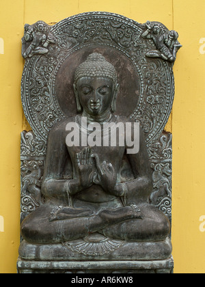 Bronze statue of the Buddha done in Indian style, located in the International Peace Gardens in Salt Lake City, Utah. Stock Photo