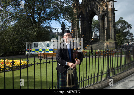 Bagpipe player, Princes Street, Edinburgh, Scotland Stock Photo