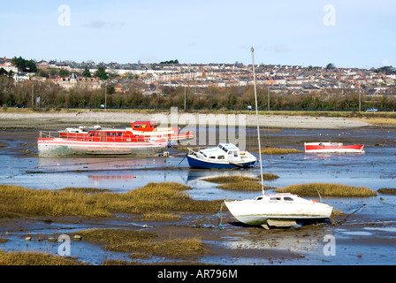 boat at low tide barry harbour barry island vale of glamorgan south wales Stock Photo