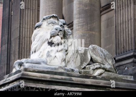 A weathered stone lion outside the Leeds City Hall in Leeds UK December 12 2007 Stock Photo