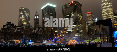 Panorama of Old City Hall and Toronto Financial towers during Wintercity Nights of Fire at night in winter Stock Photo