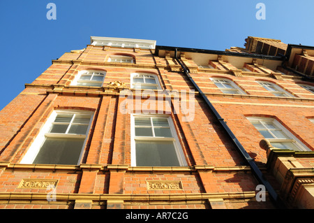 old red brick victorian building with ornate architecture at the Stock ...