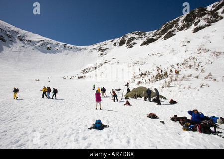 Skiers in Tuckerman Ravine in New Hampshire s White Mountains White Mountain National Forest April Stock Photo