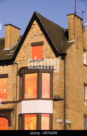 Boarded up houses on Edge Lane Liverpool using artwork to make it look better for the 2008 City of Culture year Stock Photo