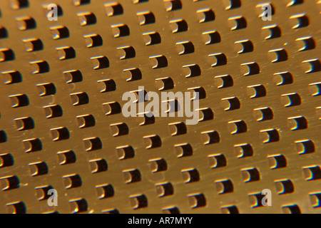 A fine grater for cheese and food as opposed to a coarse cheese grater A close up macro shot showing an abstract pattern Stock Photo