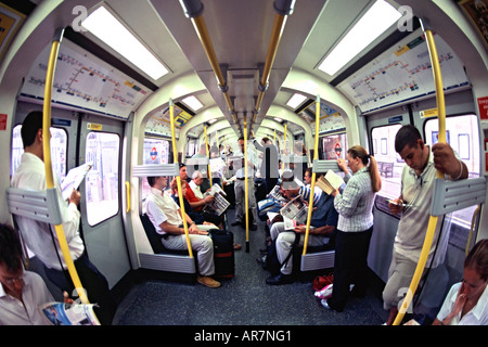 Interior of a district line underground train in London. Seen through a fish-eye lens. Stock Photo