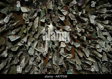 Small denominations of Chinese cash used as temple offerings to bring merit Ganden monastery – Tibet autonomous region PRC Stock Photo
