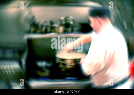 Chef working in restaurant kitchen Stock Photo